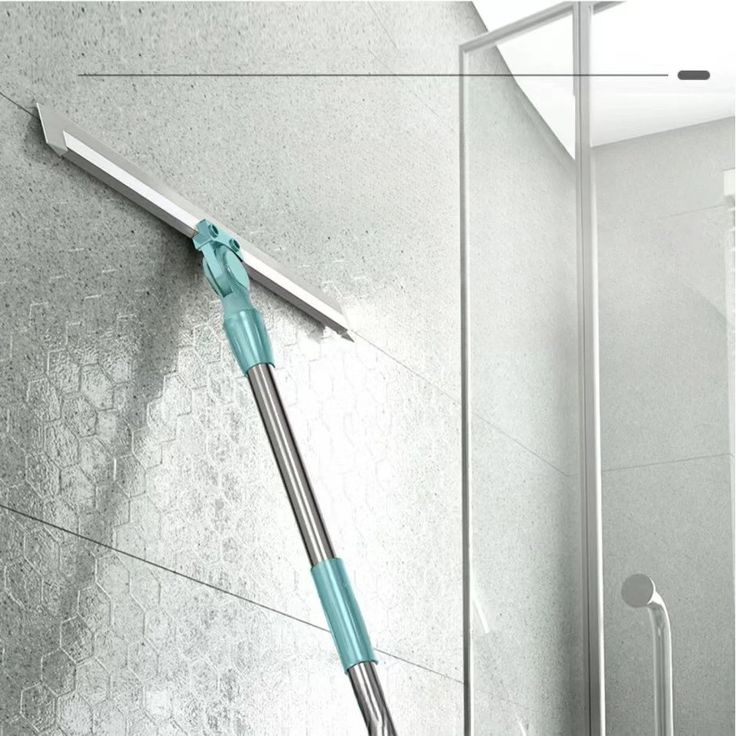 Scrapper broom wiper